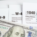 tax forms with money